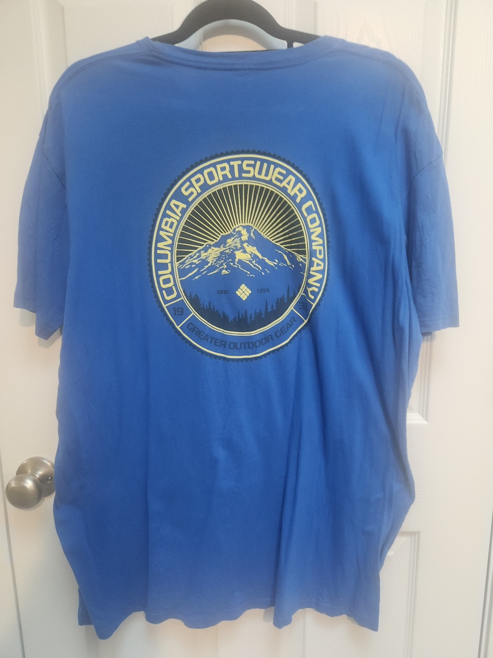 Columbia Blue Short-Sleeve Graphic Tee with Yellow Mountain Emblem